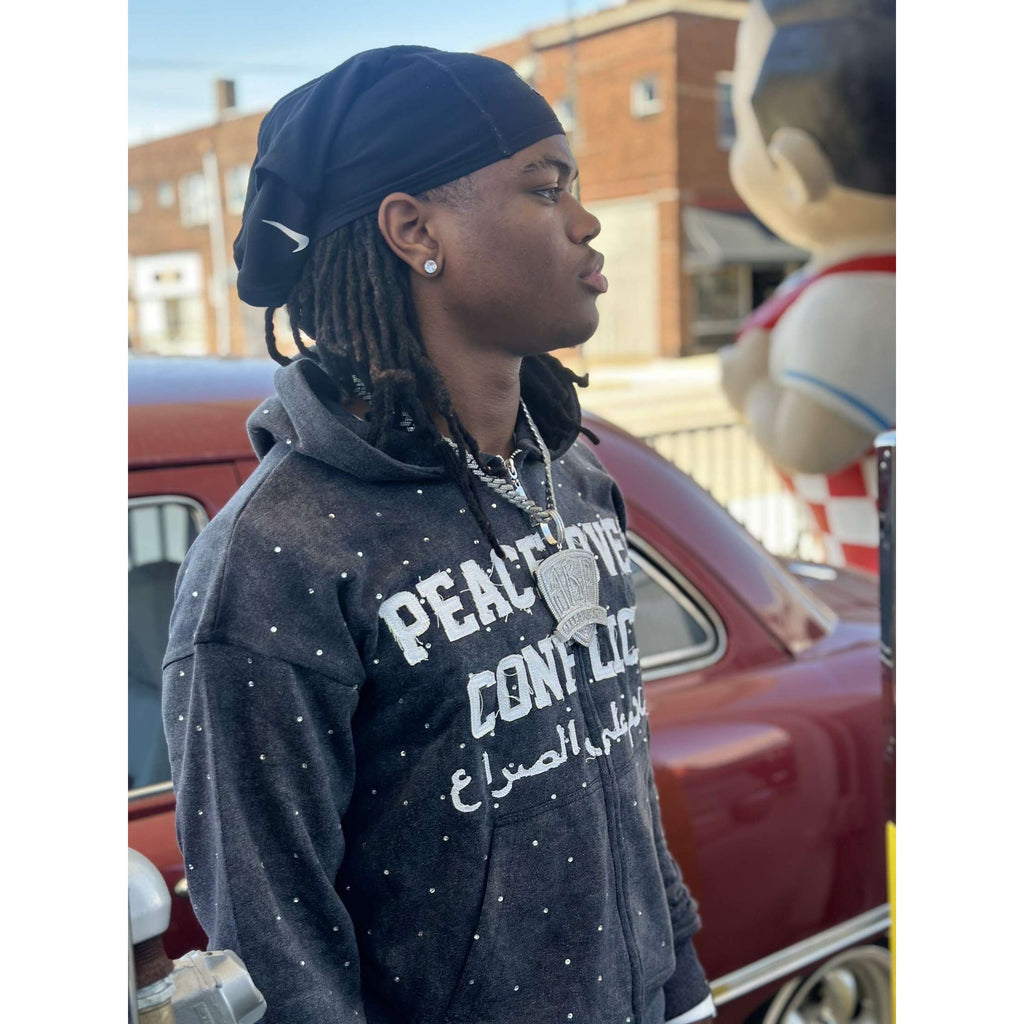 “Peace Over Conflict” Tracksuit