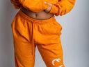 Peace Over Conflict Orange Pants