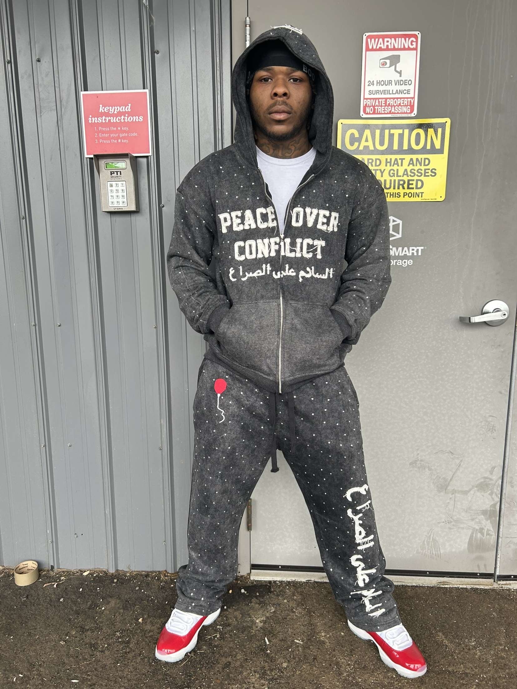 “Peace Over Conflict” Tracksuit
