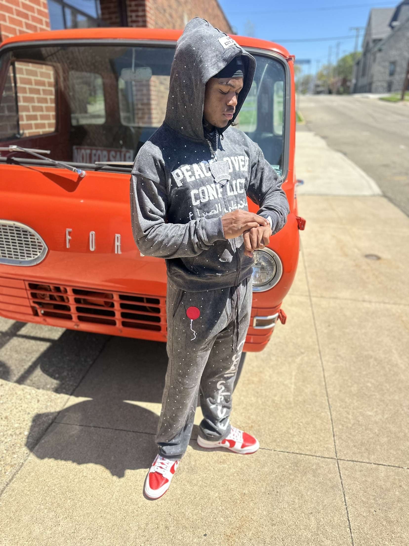 “Peace Over Conflict” Tracksuit