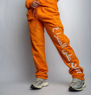Peace Over Conflict Orange Pants